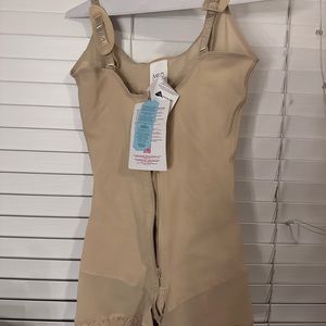 Beige faja X-Large runs small more like a medium